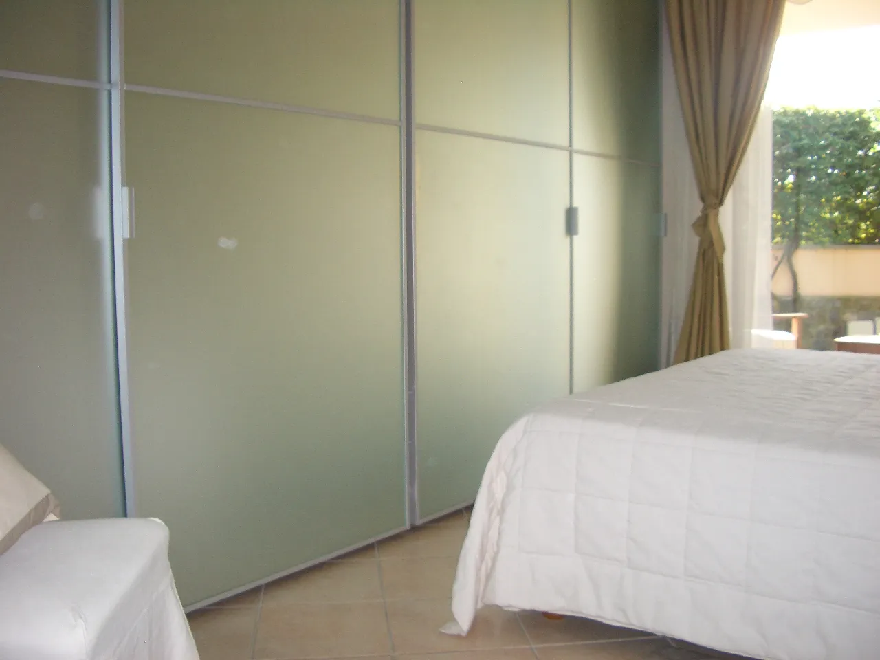 Bedroom in five-room villa in Sanremo