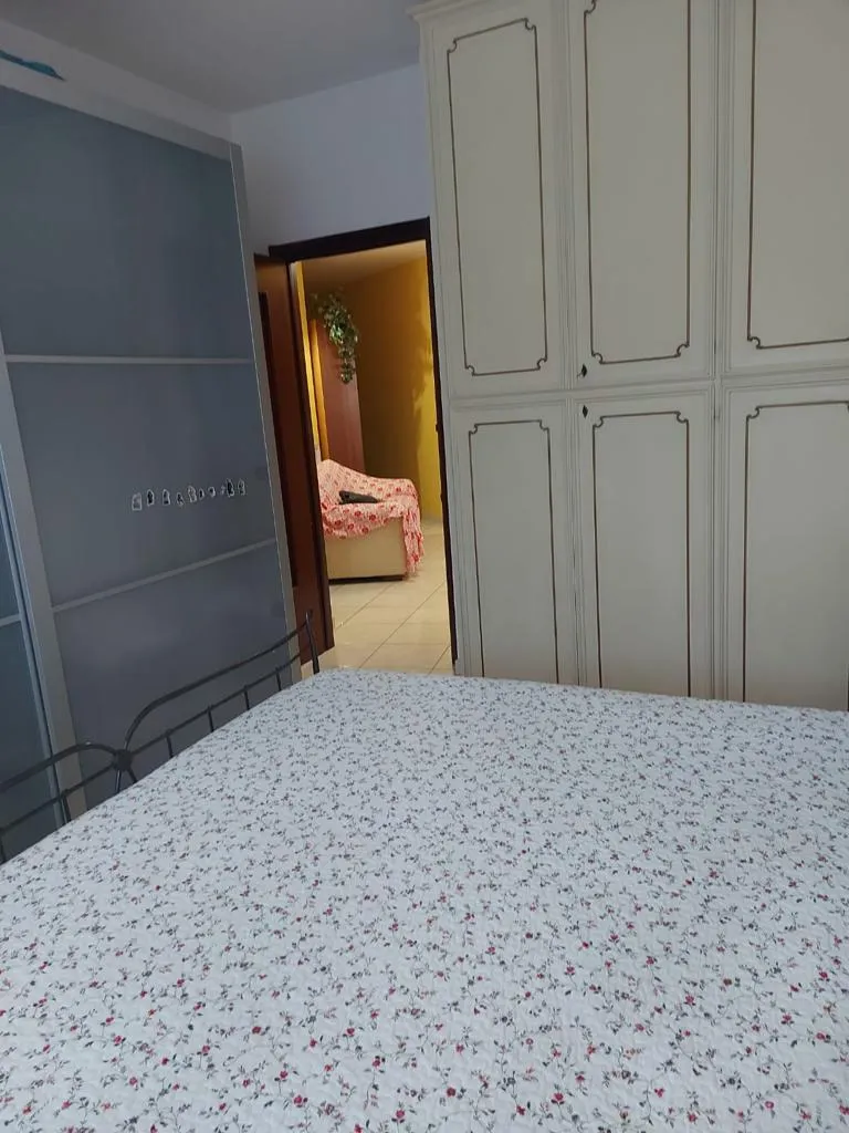 Bedroom in three-room apartment in Sanremo