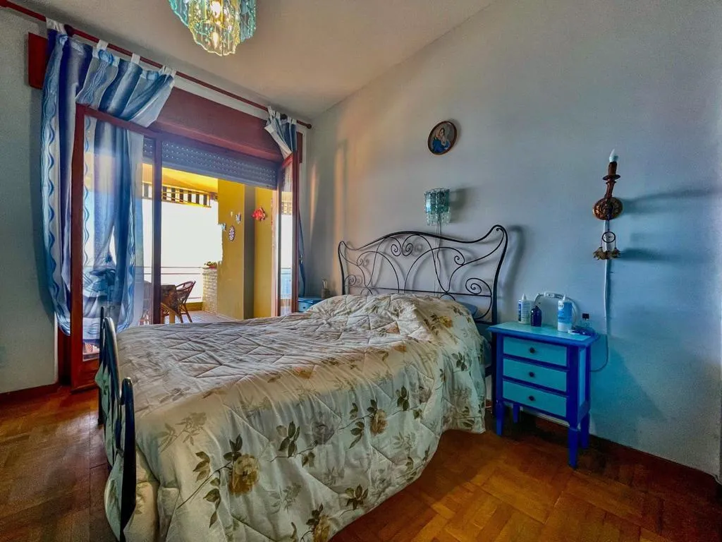 Bedroom in apartment in Ospedaletti