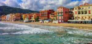 olorful houses on a beach by the sea in Liguria.